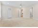 Neutral bedroom features large windows with view, recessed lights, and carpet at 1093 N Lakeside Dr, Smithfield, NC 27577