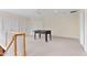 Upstairs bonus room featuring a ceiling fan, natural light and a foosball table at 1093 N Lakeside Dr, Smithfield, NC 27577