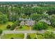 An aerial shot showing a beautiful home with mature landscaping, set back from the street at 1093 N Lakeside Dr, Smithfield, NC 27577