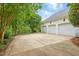 Spacious three-car garage features ample parking space and access to backyard at 1093 N Lakeside Dr, Smithfield, NC 27577