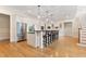 Bright, modern kitchen with stainless steel appliances, island seating, and open layout at 1093 N Lakeside Dr, Smithfield, NC 27577