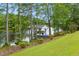 Scenic view of a lakeside dock surrounded by lush greenery, offering a serene and private waterfront experience at 1093 N Lakeside Dr, Smithfield, NC 27577