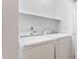 Convenient laundry room with modern, matching washer and dryer units at 1093 N Lakeside Dr, Smithfield, NC 27577