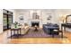Comfortable living room with a fireplace, built-in shelving, and classic furniture at 1093 N Lakeside Dr, Smithfield, NC 27577