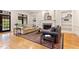 Cozy living room with hardwood floors, fireplace, built-in shelves, and comfortable seating at 1093 N Lakeside Dr, Smithfield, NC 27577