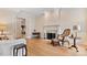 Living room featuring a fireplace, hardwood floors, and ample natural light at 1093 N Lakeside Dr, Smithfield, NC 27577