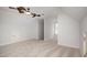 Open bonus room with neutral carpet, and access to another room at 1148 Dexter Ridge Dr, Holly Springs, NC 27540