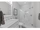 Elegant bathroom featuring a glass shower with marble tile and a modern vanity at 120 Harmony Hill Ln, Cary, NC 27513