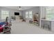 Spacious bedroom with plenty of room for play and natural light from windows at 120 Harmony Hill Ln, Cary, NC 27513