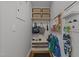 Organized mudroom with built-in storage, hooks, and shelving for coats and shoes at 120 Harmony Hill Ln, Cary, NC 27513