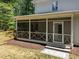 Charming screened porch with access to backyard at 120 Harmony Hill Ln, Cary, NC 27513