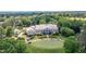 An aerial view of the Wakefield Plantation Country Club overlooking the golf course at 12317 Richmond Run Dr, Raleigh, NC 27614