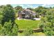 Find your dream home on this estate lot featuring mature trees, a backyard patio, and custom outdoor living space at 12317 Richmond Run Dr, Raleigh, NC 27614
