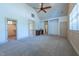 Expansive bonus room with a wet bar, closet and multiple windows at 12317 Richmond Run Dr, Raleigh, NC 27614
