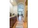 Butler pantry features granite counters and is adjacent to primary bedroom at 12317 Richmond Run Dr, Raleigh, NC 27614