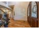 Beautiful foyer with hardwood floors, a decorative front door, and views of adjacent living areas at 12317 Richmond Run Dr, Raleigh, NC 27614