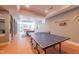 Expansive game room with ping pong, pool table, and ample space for entertainment and leisure at 12317 Richmond Run Dr, Raleigh, NC 27614