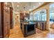 Gourmet kitchen featuring stainless steel appliances, granite countertops, and a central island at 12317 Richmond Run Dr, Raleigh, NC 27614