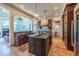 Gourmet kitchen with central island, breakfast bar, and stainless steel appliances at 12317 Richmond Run Dr, Raleigh, NC 27614
