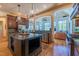 Gourmet kitchen featuring stainless steel appliances, granite countertops, and a central island at 12317 Richmond Run Dr, Raleigh, NC 27614