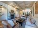 Spacious living room with fireplace, archways, and hardwood floors at 12317 Richmond Run Dr, Raleigh, NC 27614