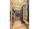 Large walk-in closet with custom shelving and ample storage space at 12317 Richmond Run Dr, Raleigh, NC 27614