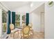 Bright dining area with skylight, patio access, and views of the exterior at 1315 Brigham Rd, Chapel Hill, NC 27517