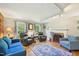 Inviting living room with fireplace, hardwood floors, and comfortable seating at 1315 Brigham Rd, Chapel Hill, NC 27517