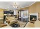 Spacious living room showcases an open floor plan with dark floors and modern furniture at 140 Sunstone Dr, Cary, NC 27519