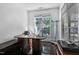 Bright home office featuring a large desk, display case, and natural light at 140 Sunstone Dr, Cary, NC 27519