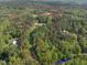 Aerial view of wooded area with road at 1656 Nc-42 Hwy, Moncure, NC 27559