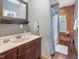 Bathroom featuring a vanity and shower at 1656 Nc-42 Hwy, Moncure, NC 27559