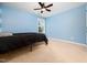 Cozy bedroom with neutral carpet and a window for natural light at 1719 Willowcrest Rd, Durham, NC 27703