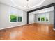 Bright dining area with hardwood floors, lots of natural light, and a sleek design at 1719 Willowcrest Rd, Durham, NC 27703