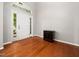 Bright foyer featuring hardwood floors, a neutral color palette, and an elegant entryway with sidelights at 1719 Willowcrest Rd, Durham, NC 27703