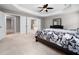 Spacious main bedroom with a tray ceiling and an en-suite bathroom with tub and shower at 1719 Willowcrest Rd, Durham, NC 27703