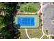 Overhead shot of tennis court surrounded by trees at 1719 Willowcrest Rd, Durham, NC 27703