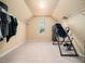 Large walk-in closet with shelving and natural light from window at 1719 Willowcrest Rd, Durham, NC 27703