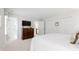 A bedroom shows a cherry wood dresser between two closet doors at 1904 Victoria Rd, Raleigh, NC 27608