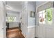 Bright kitchen with stainless appliances and connected to the entry door at 1904 Victoria Rd, Raleigh, NC 27608