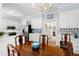 Bright kitchen with stainless appliances and connected dining area at 1904 Victoria Rd, Raleigh, NC 27608