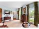 Bright living room with large windows, natural light, and elegant decor at 1904 Victoria Rd, Raleigh, NC 27608