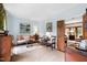 Cozy living room featuring a neutral color palette and comfortable seating arrangement at 1904 Victoria Rd, Raleigh, NC 27608