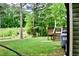 Spacious backyard with a wooden deck, perfect for outdoor entertaining and relaxation at 1980 Ferbow St, Creedmoor, NC 27522