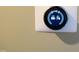 Close-up of a Nest thermostat displaying the current temperature settings at 1980 Ferbow St, Creedmoor, NC 27522