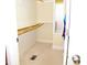This carpeted walk-in closet features wood shelves and a mirrored wall at 1980 Ferbow St, Creedmoor, NC 27522