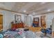 Bedroom featuring hardwood floors, with ample natural light, providing a serene and comfortable atmosphere at 2010 Summerdale Dr, Raleigh, NC 27604