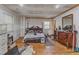 Spacious bedroom showing hardwood floors and natural light from the windows, offering a comfortable retreat at 2010 Summerdale Dr, Raleigh, NC 27604