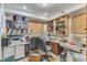 Cozy office space with built-in shelving, a desk, and a comfortable chair, perfect for working from home at 2010 Summerdale Dr, Raleigh, NC 27604