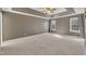 Spacious main bedroom featuring a ceiling fan and natural light at 2037 Summer Shire Way, Raleigh, NC 27604
